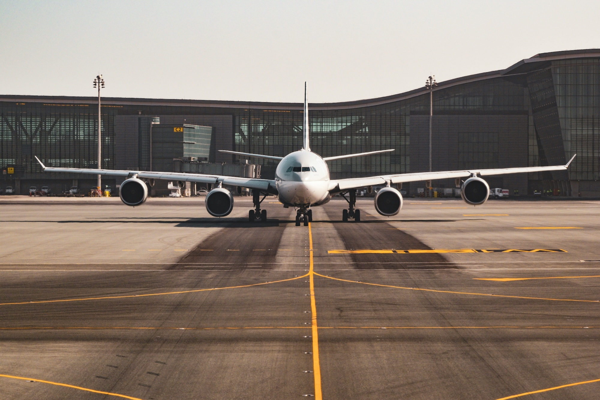 White airplane on tarmac ready for departure